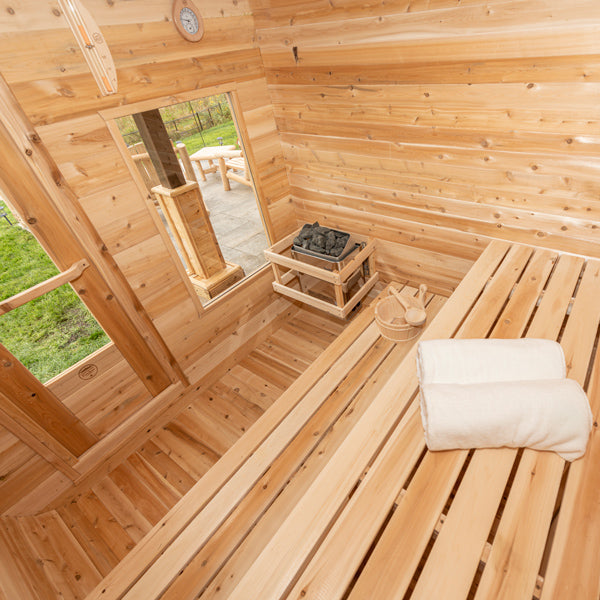 LeisureCraft CT Luna Sauna interior with bucket and towels