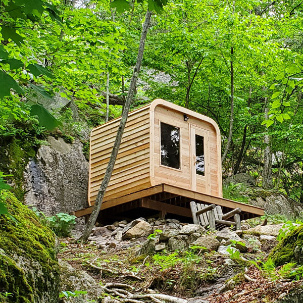 LeisureCraft CT Luna Sauna sited on a rocky outcrop