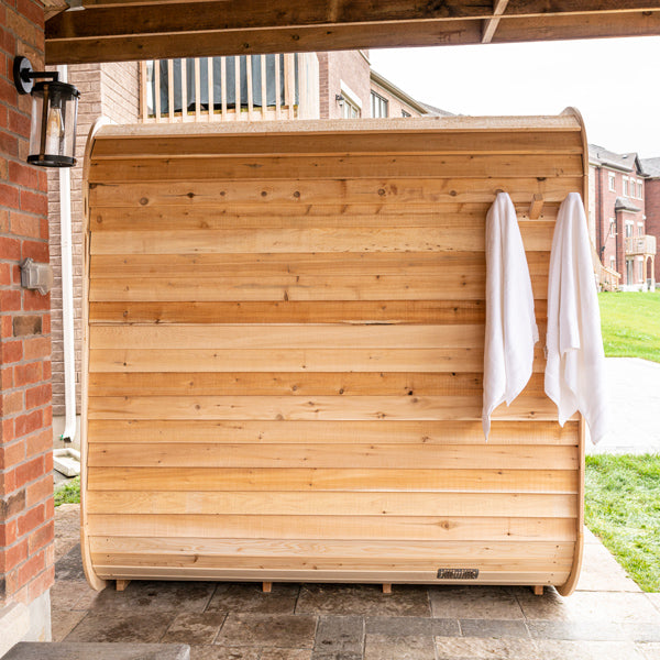 LeisureCraft CT Luna Sauna exterior with towels hung by the door
