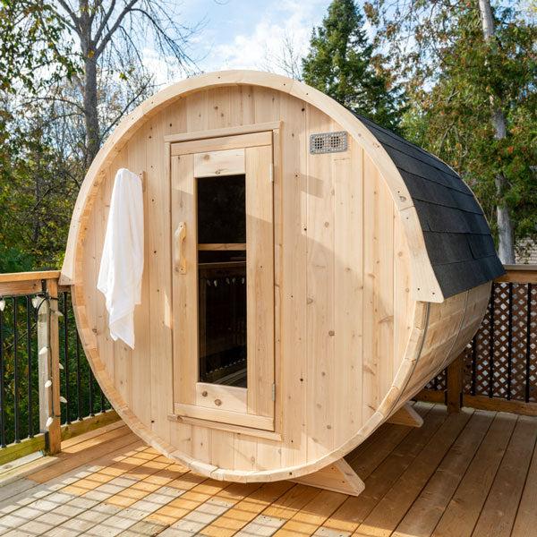 LeisureCraft CT Barrel Sauna on a backyard deck