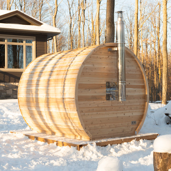 LeisureCraft CT Elation Sauna with wood-burning chimney in a wooded setting