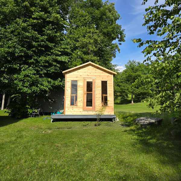 LeisureCraft CT Cabin Sauna on an open lawn